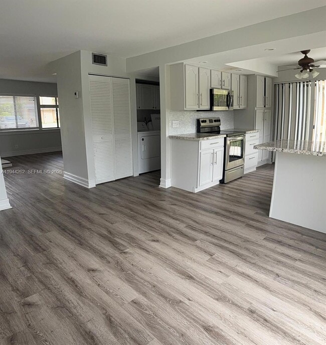 property at 242 Wimbledon Lakes Dr