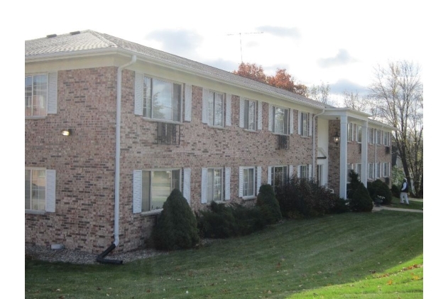 Carriage house Apartments in Berlin, WI - Building Photo