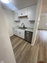 1206 Spring St in Syracuse, NY - Foto de edificio - Building Photo