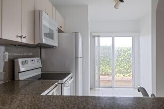 940 NE 33rd Terrace, Unit 102 in Homestead, FL - Building Photo - Building Photo