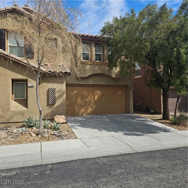 7166 Indian Gap Ave in Las Vegas, NV - Building Photo - Building Photo