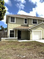 140 Pheasant Run Blvd in West Palm Beach, FL - Building Photo