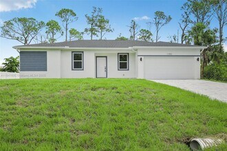 11992 Atoll Ave in Port Charlotte, FL - Building Photo - Building Photo