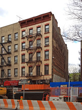 51 E Houston St in New York, NY - Building Photo - Building Photo