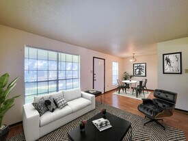 Carriage Park Apartments in Groves, TX - Building Photo