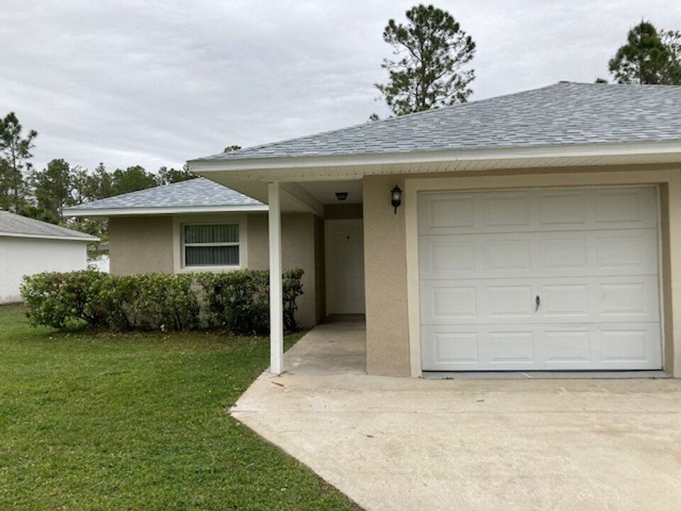 12 Wheaton Ln-Unit -A in Palm Coast, FL - Building Photo