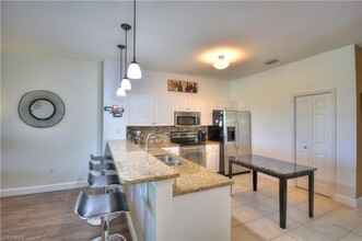 10021 Heather Ln in Naples, FL - Building Photo - Building Photo