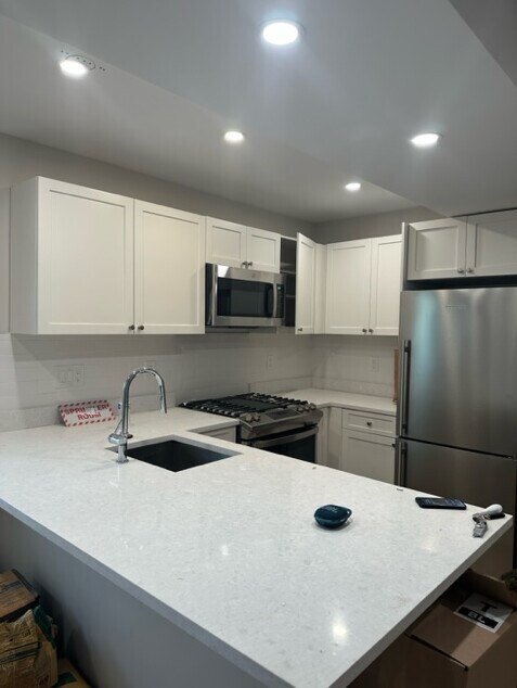 13 Greylock Rd, Unit 4 in Boston, MA - Foto de edificio - Building Photo