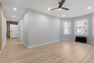 7383 N Damen Ave, Unit 1e in Chicago, IL - Foto de edificio - Building Photo
