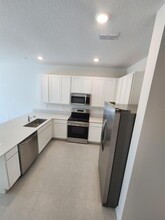 2918 Savoir Ave in Davenport, FL - Foto de edificio - Building Photo
