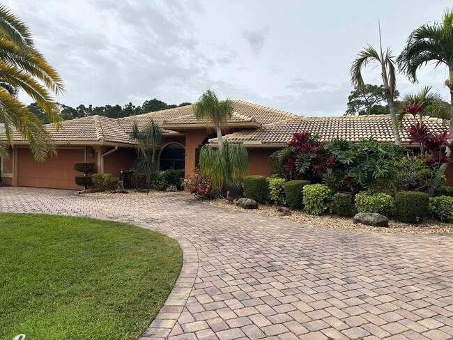 property at 1180 SW Mirror Lake Cove