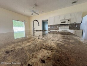7585 Fringe Pl in Cocoa, FL - Building Photo - Building Photo