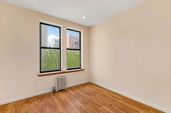 property at 619 E 5th St