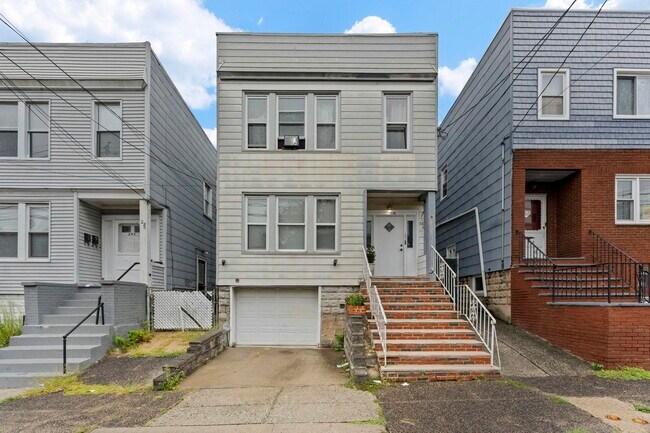 property at 296 Pearsall Ave