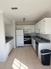 1701 The Greens Way, Unit 1323 in Jacksonville Beach, FL - Foto de edificio - Building Photo