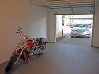 Garages and private driveways are available. - Avery Place Villas Apartments in Orlando, Florida