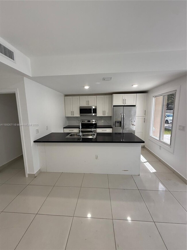 property at 13984 SW 259th Way