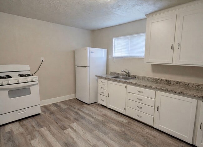 property at 1833 E 3rd St