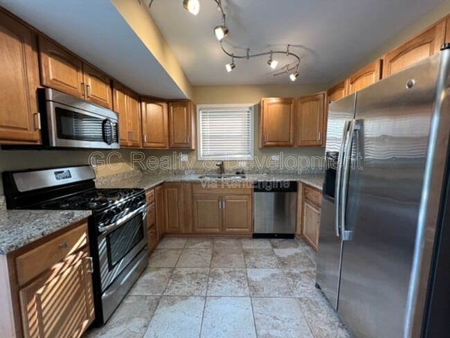 12 Wild Rose Ct in Streamwood, IL - Building Photo - Building Photo