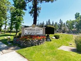 Marbella Villa Apartments in Chino, CA - Building Photo