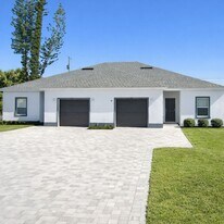 3437 SW 8th Pl in Cape Coral, FL - Building Photo