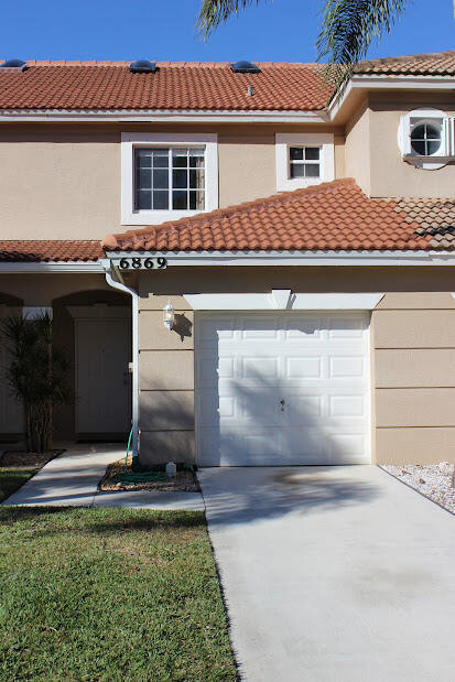 6869 Brook Hollow Rd in Greenacres, FL - Building Photo