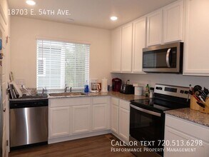 18703 E 54th Ave in Denver, CO - Building Photo - Building Photo