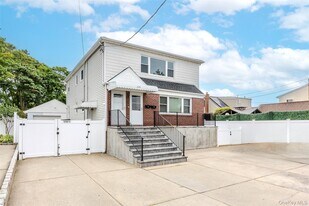 214 Carman Ave in East Rockaway, NY - Building Photo