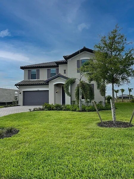 19780 The Pl Blvd in Estero, FL - Building Photo