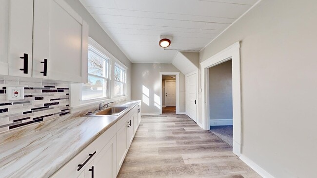 property at 7408 Dudley Ave