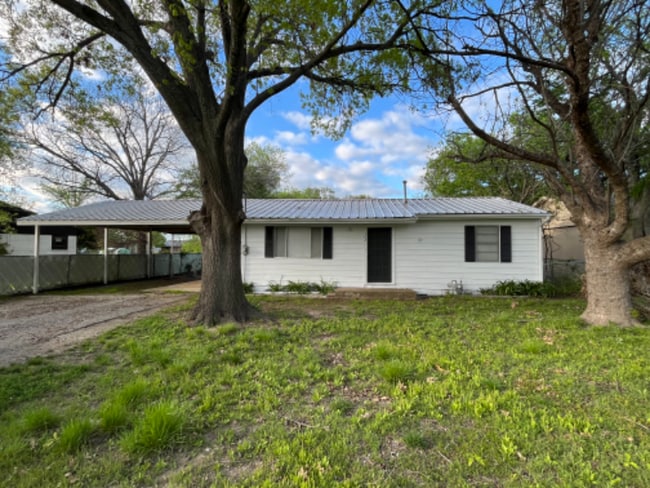 property at 102 E Pecan St
