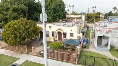 1557-1559 1/2 W 52nd St in Los Angeles, CA - Building Photo - Building Photo