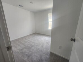 906 Pertuso Ln in Huffman, TX - Foto de edificio - Building Photo