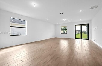 1155 Tangled Orchard Tr in Loxahatchee, FL - Building Photo - Building Photo
