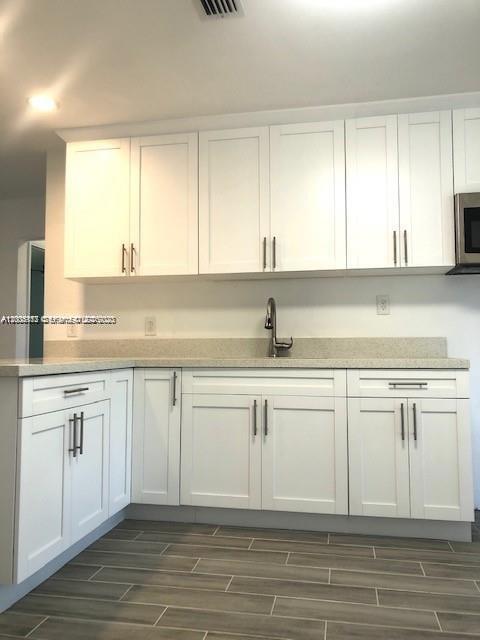 215 SW 10th St