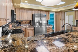 12934 W Blue Sky Dr in Sun City West, AZ - Building Photo - Building Photo