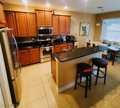 1497 Birdie Dr in Naples, FL - Foto de edificio - Building Photo