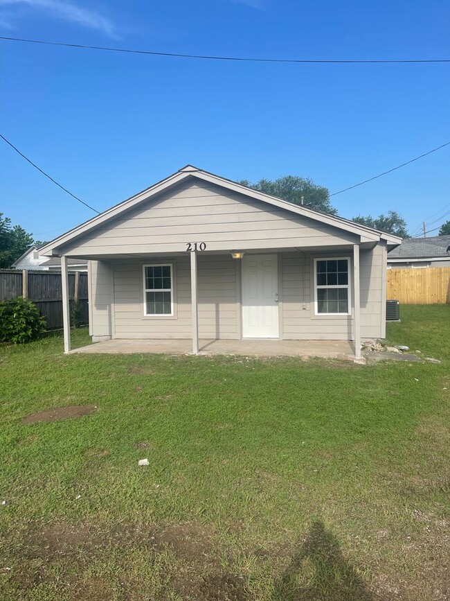 property at 210 N Ash St