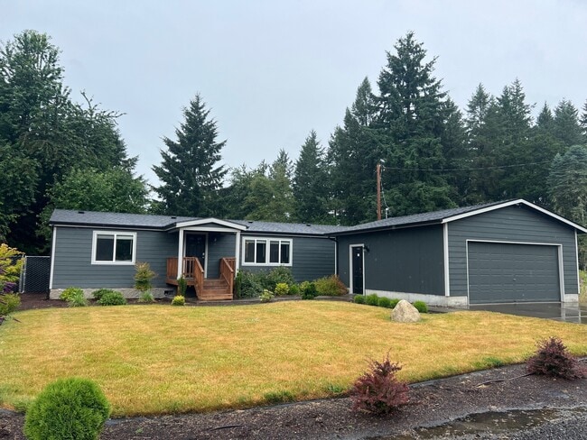 property at 900 NW Peacock Ln