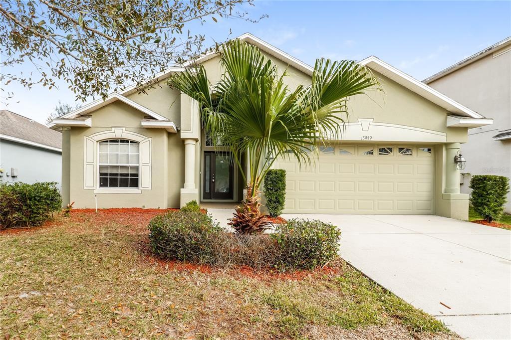 13959 Caden Glen Dr in Hudson, FL - Building Photo