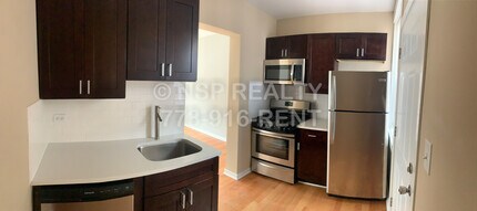 1648 W Pratt Blvd, Unit 2L in Chicago, IL - Foto de edificio - Building Photo