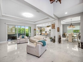 5857 Whippoorwill Cir in Westlake, FL - Building Photo