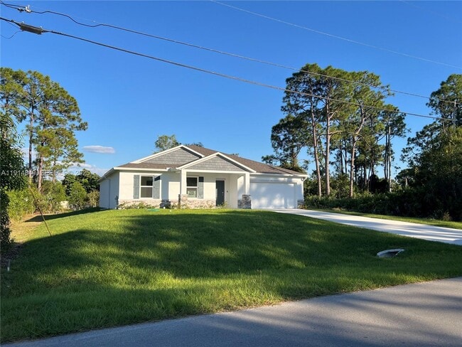 55 Douglas Ave S in Lehigh Acres, FL - Building Photo - Building Photo