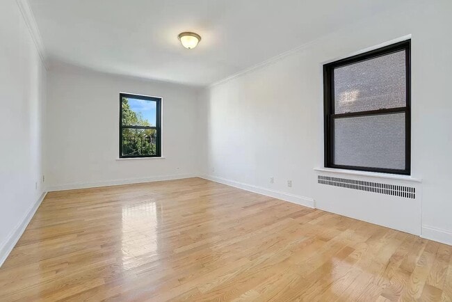 property at 76-66 Austin St