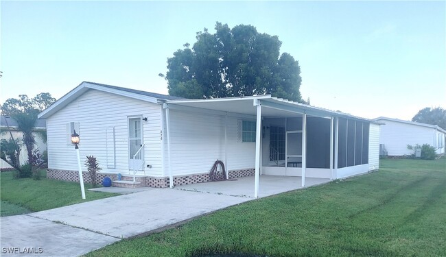 276 Grosbeak Ln in Naples, FL - Foto de edificio - Building Photo