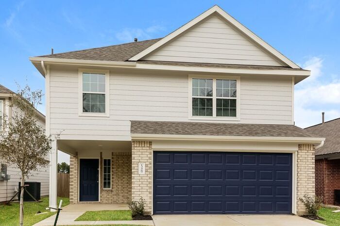 13589 White Ibis St in Splendora, TX - Building Photo
