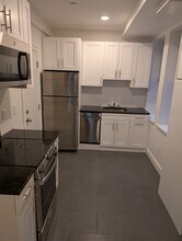 132 Sutherland Rd, Unit A in Boston, MA - Foto de edificio - Building Photo
