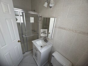 Fully Renovated 1-Bedroom Apartment in the in Queens, NY - Building Photo - Building Photo