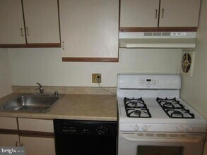 1921 Wilson Ln-Unit -303 in McLean, VA - Building Photo - Building Photo