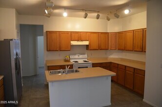 16190 W Winchcomb Dr in Surprise, AZ - Building Photo - Building Photo